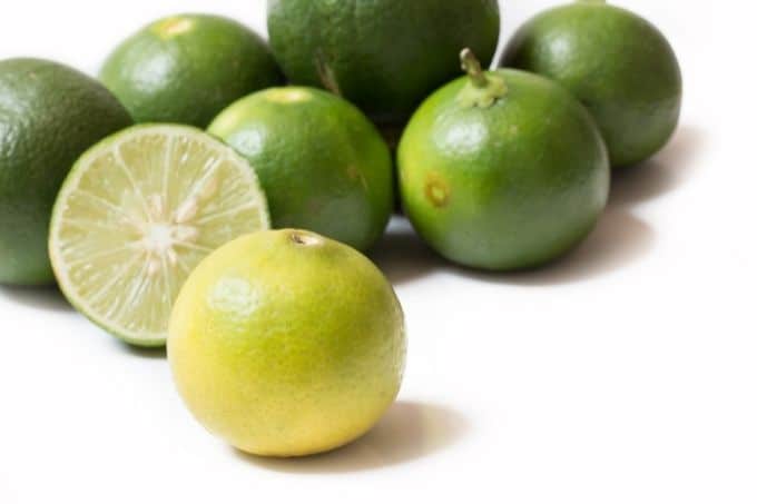 key limes on white background