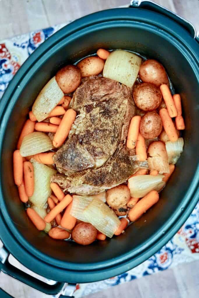 roast, carrots, potatoes, and onions in the crock pot