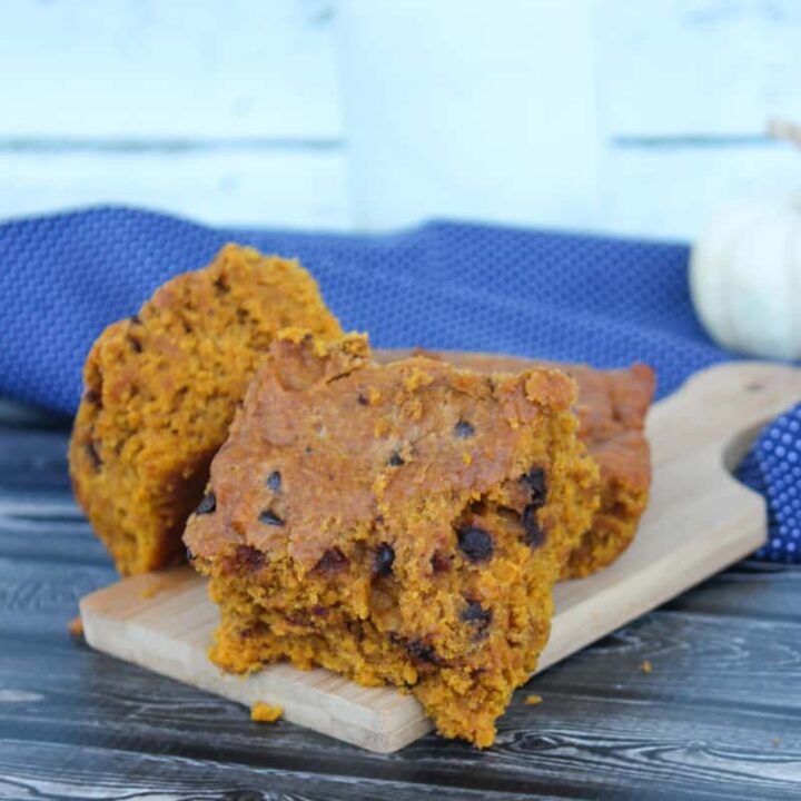 pumpkin chocolate chip blondies on small cutting board