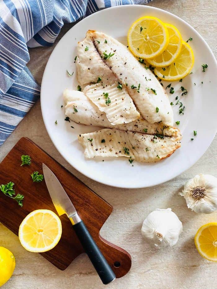 air fried tilapia on a white plate