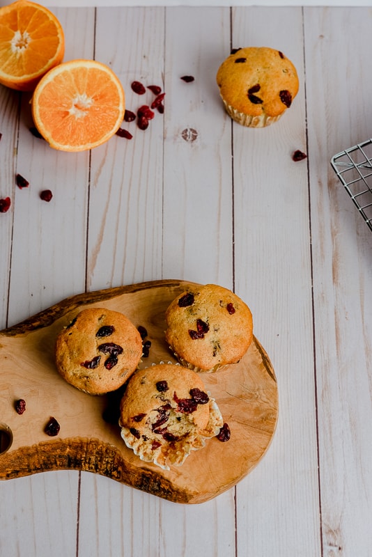 cranberry orange muffins with oranges and cranberries