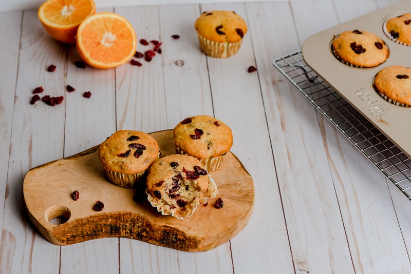 bite taken out of one of three muffins