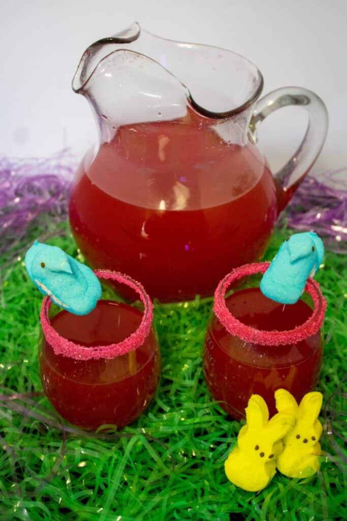red easter party punch garnished with Marshmallow Peeps