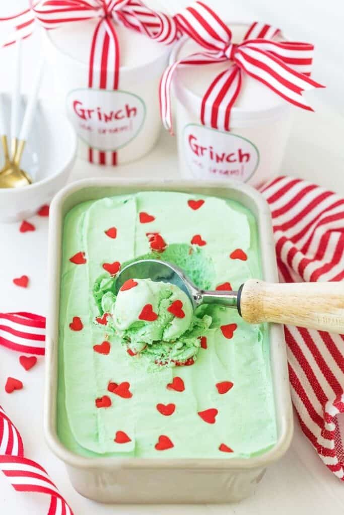 grinch ice cream in a loaf pan with ice cream scoop
