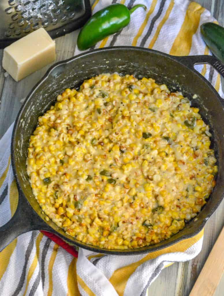 smoked jalapeno creamed corn in cast iron pan