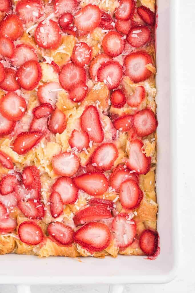 strawberry coconut breakfast casserole in white dish