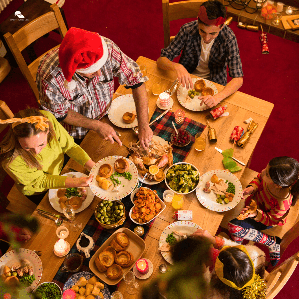 Family enjoying Christmas dinner.