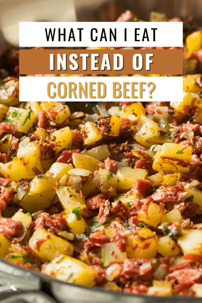 Savory homemade corned beef hash in a pan. with text: What can I eat instead of corned beef
