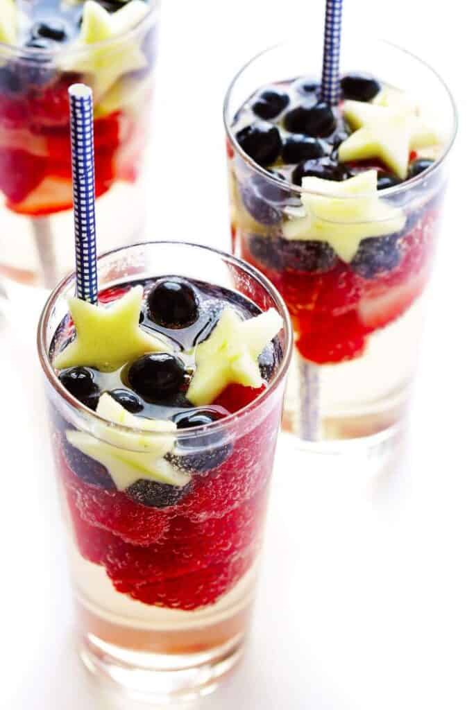 red white and blue sangria in 3 glasses