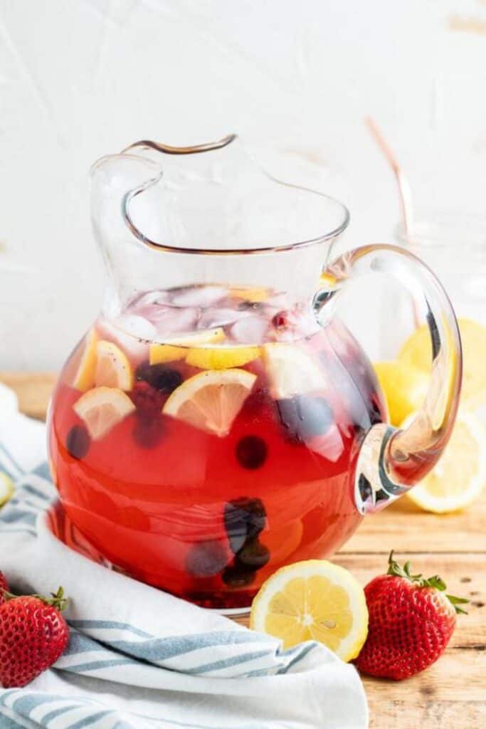 spiked berry lemonade in pitcher