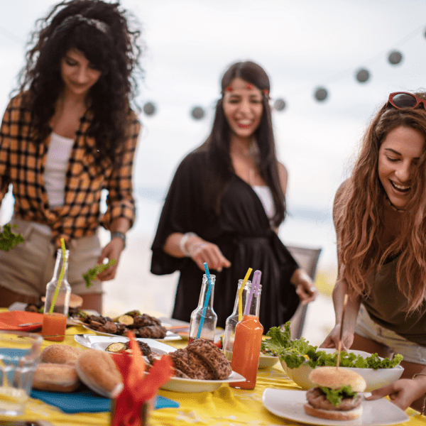 Female friends enjoying a BBQ party.