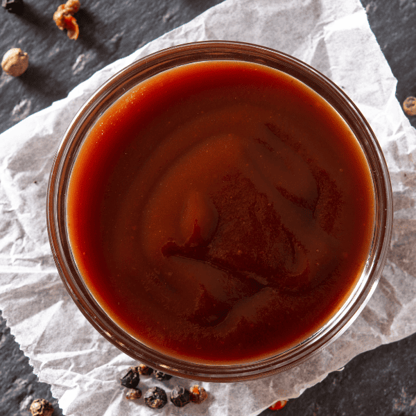 BBQ sauce in a glass bowl.