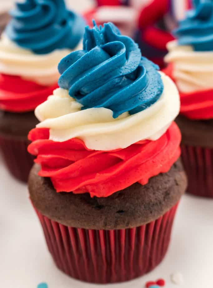 chocolate cupcakes with red white and blue swirl frosting