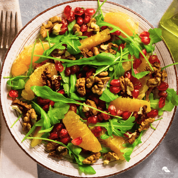 A top shot of an orange and pomegranate salad.