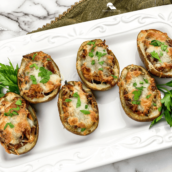 an overview shot of Baked Potato Skins – Classic Version on a white plate