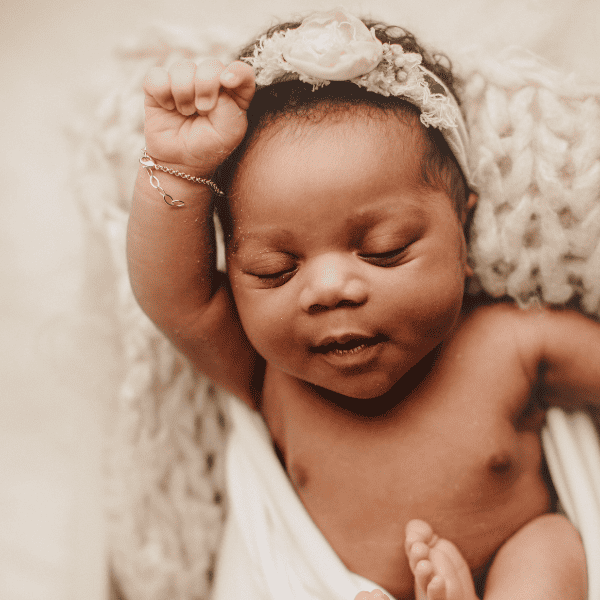 Portrai of a newborn sleeping.