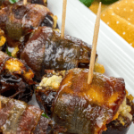 a pin-sized close up image of Bacon Wrapped Stuffed Dates