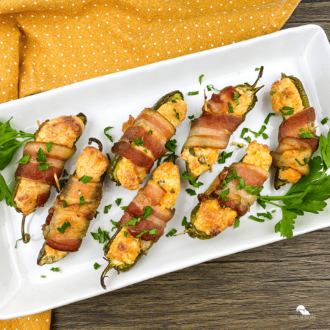 Bacon Wrapped Jalapeno Poppers in a white plate