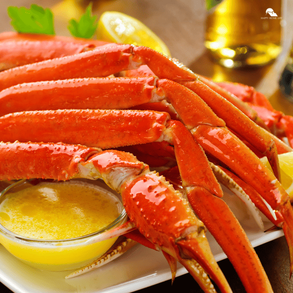 an image of cooked crab on a white plate