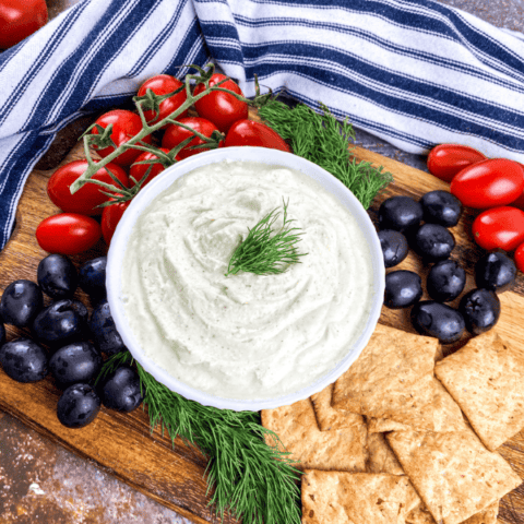 an overview image of Whipped Feta Dip with Black Olives and Cherry Tomatoes