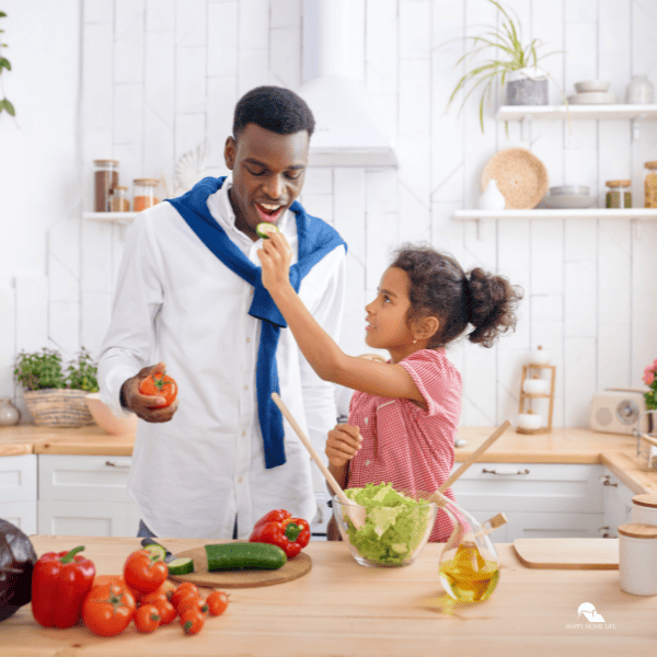 father and daughter meal prepping