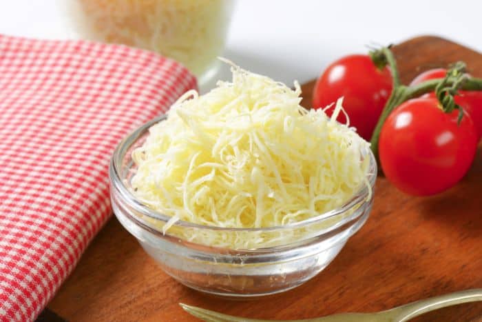 freshly grated horseradish in clear glass bowl