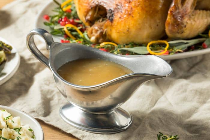 turkey gravy in silver gravy boat