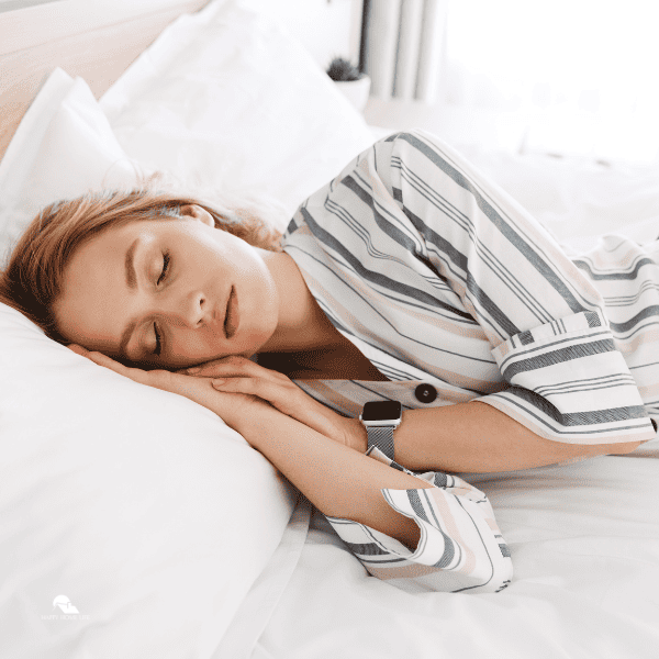 an image of woman sleeping in bed