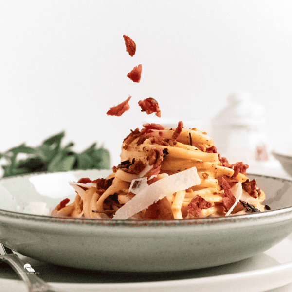 Browned Butter, Pumpkin, and Bacon Linguine in a plate