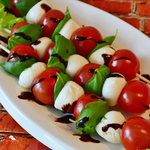 an image of caprese skewers