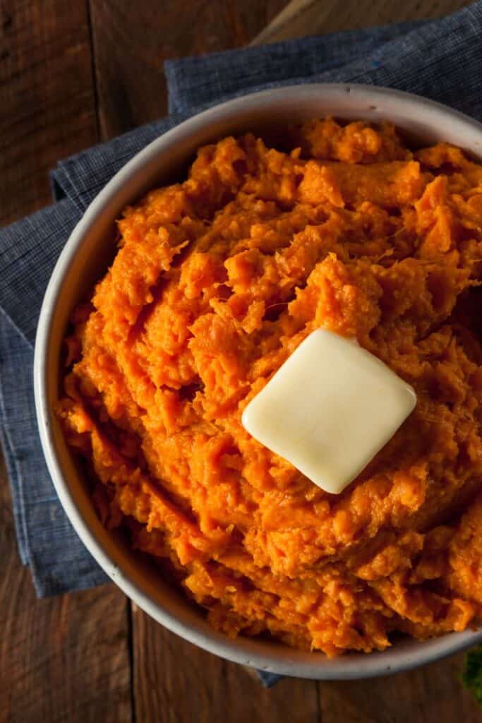 mashed sweet potatoes with pat of butter