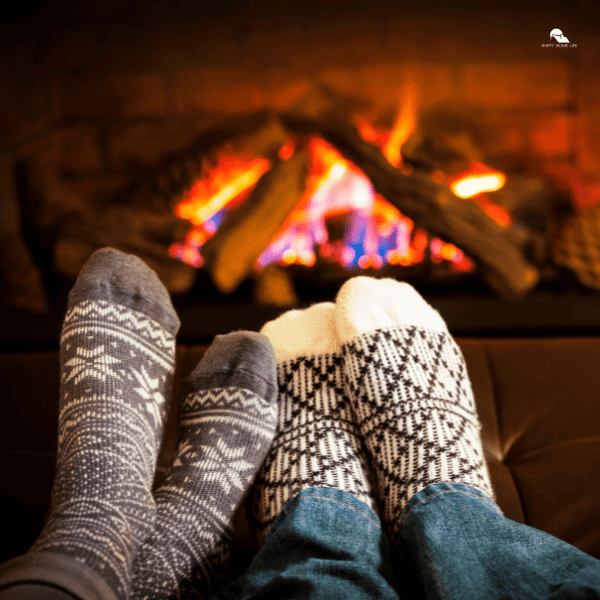 Feet Warming by Fireplace