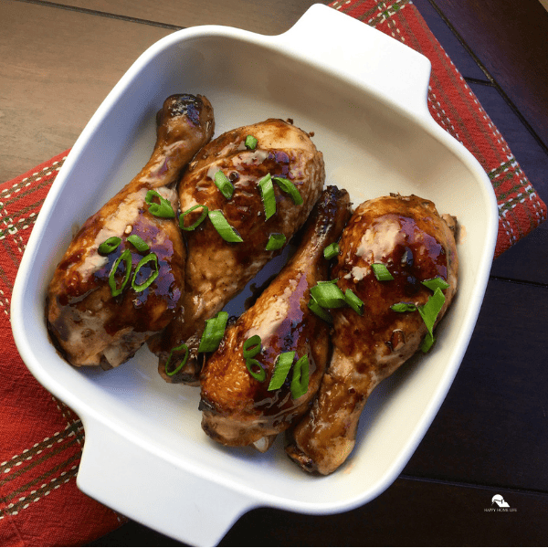 Balsamic Glazed Chicken Drumsticks in a white bowl