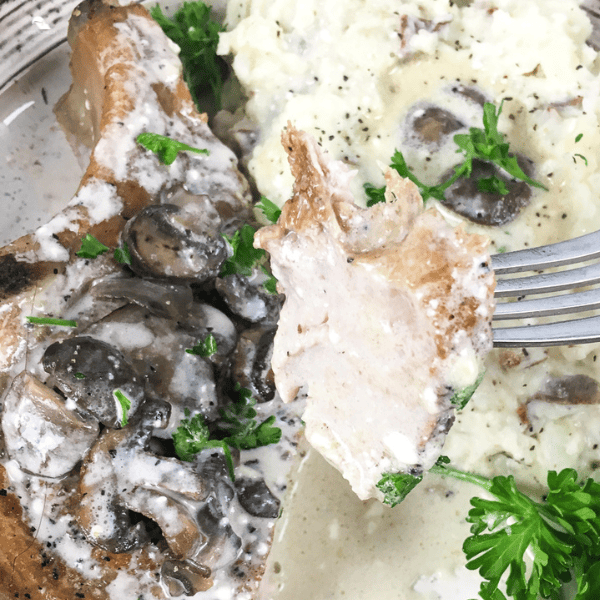 Slow Cooker Thick-Cut Bone-In Pork Chops close up image