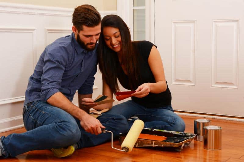 couple looking at paint samples