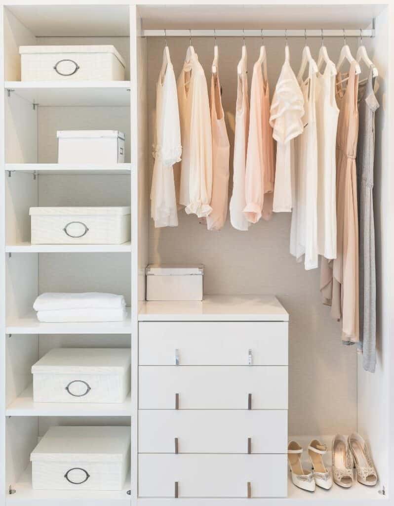 closet with woman's clothes and shoes