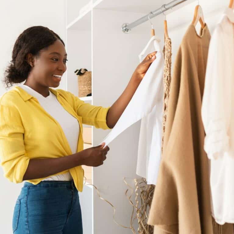 woman choosing clothes to wear