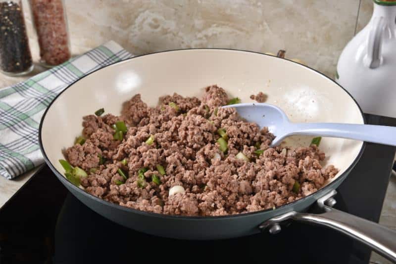 cooked ground beef in a skillet