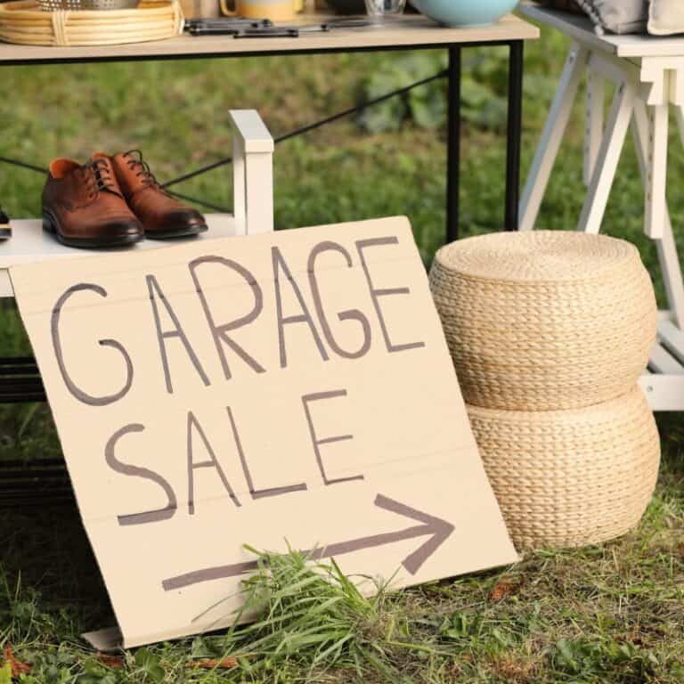 garage sale sign in yard