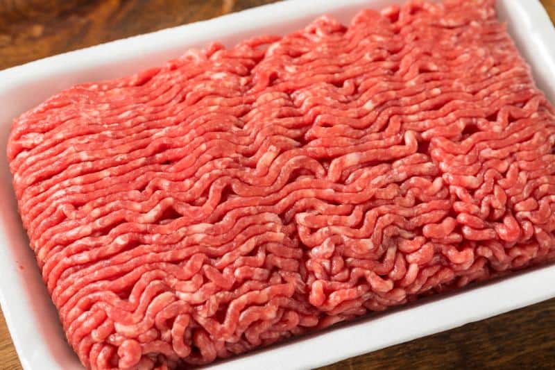 raw ground beef in white foam tray