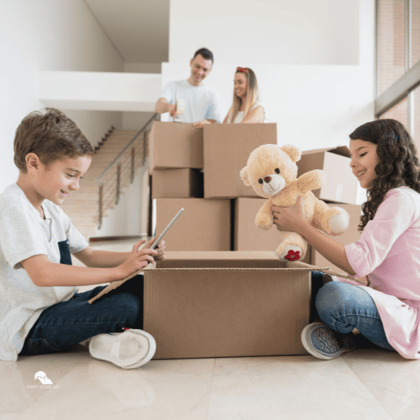 Happy kids packing and moving house