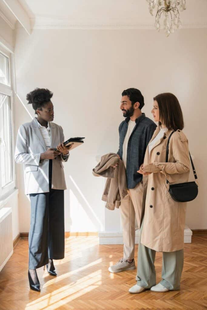 couple meeting with real estate agent