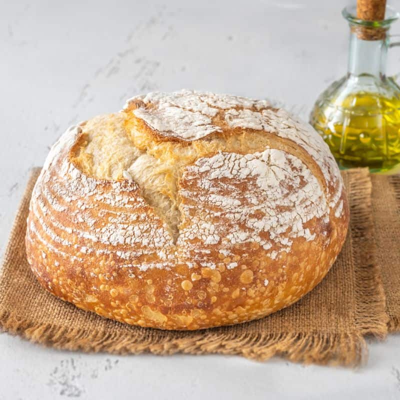 loaf of sourdough bread with olive oil