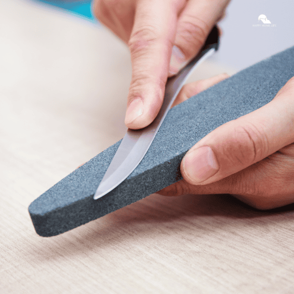 kitchen knife being sharpened