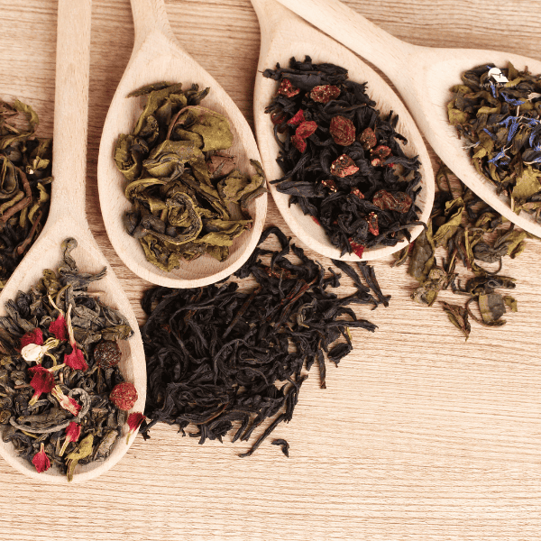 image of Loose Leaf Tea on Wooden Spoons