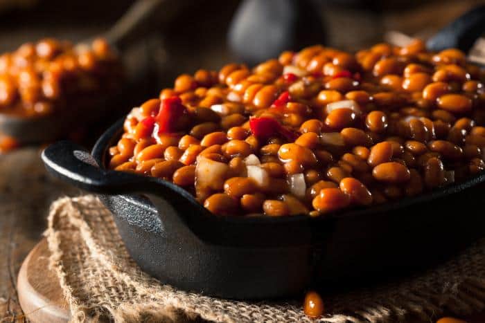 barbecue baked beans in a cast iron pan