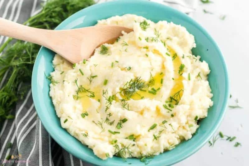 buttery ranch mashed potatoes in a teal bowl