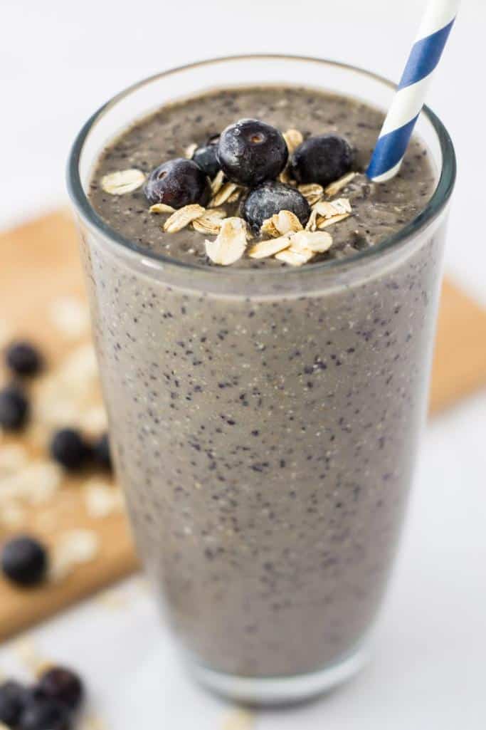 blueberry oatmeal smoothie in tall glass