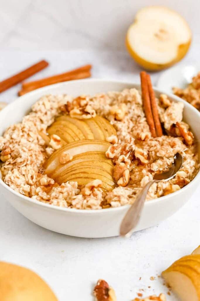 cinnamon pear walnut oatmeal in white bowl