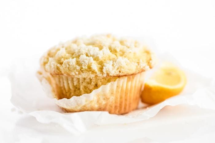 lemon streusel muffin in white cupcake wrapper